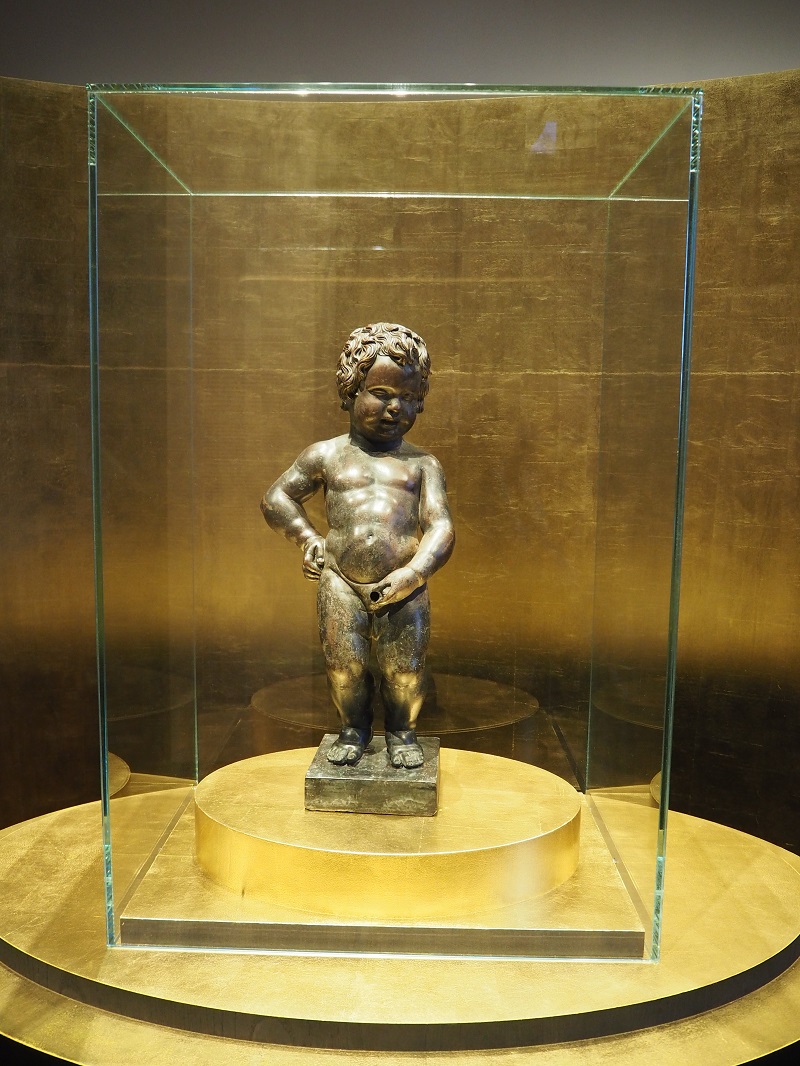 the original manneken pis displayed at the brussels city museum