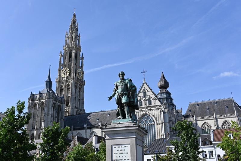 Rubens memorial in groenplaats antwerp with cathedral tower in the background